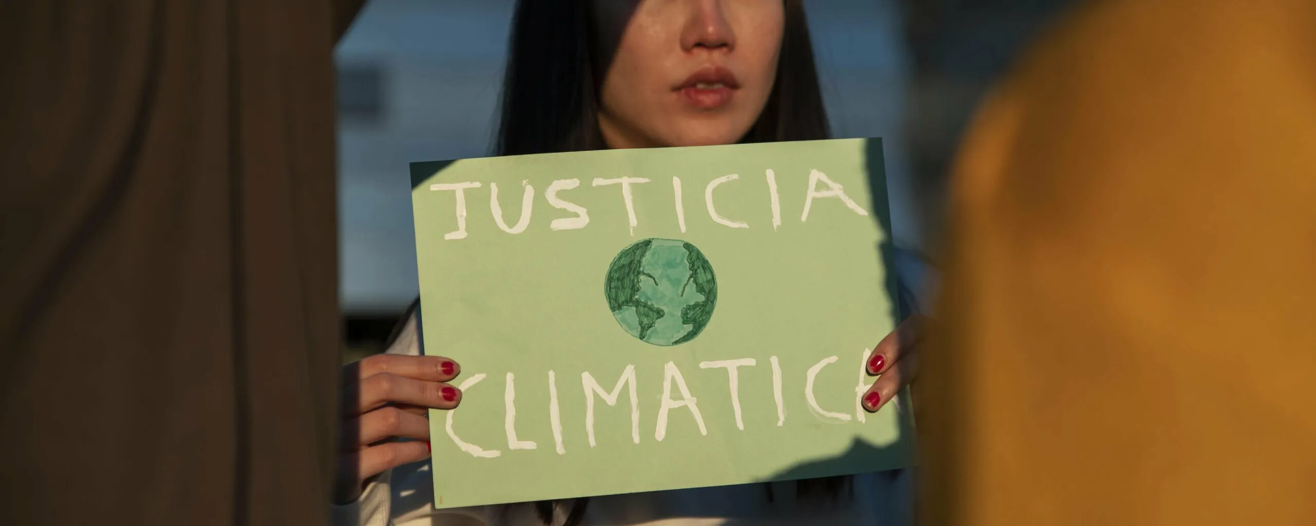 close-up-woman-fighting-climate-scaled.jpg